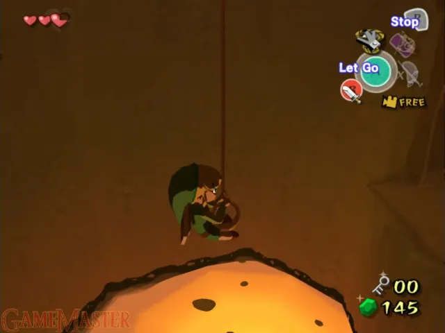 Link hangs from his grappler's rope.